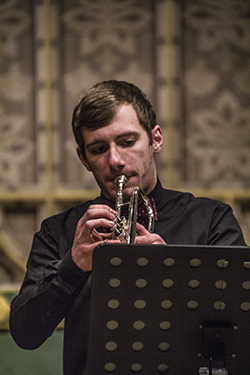 Ryan Sayce, playing trumpet